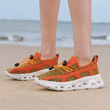 Orangefarbene AquaVibe-Wasserschuhe